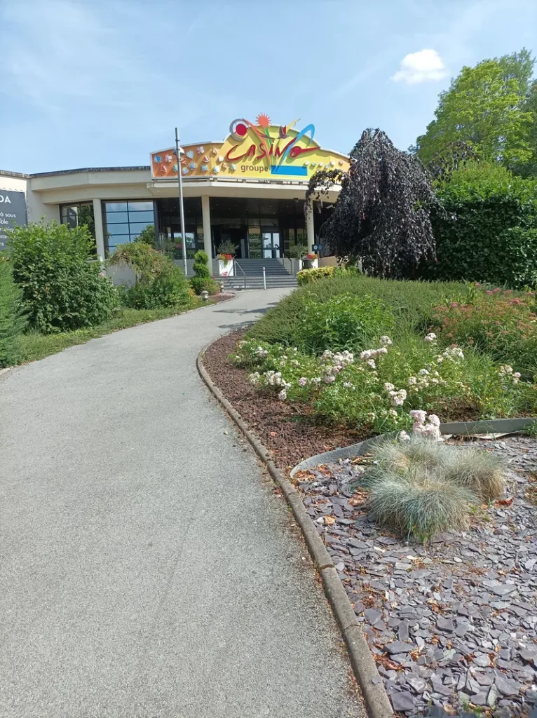 Garden path leading to Casino JOA de Bourbonne-les-Bains