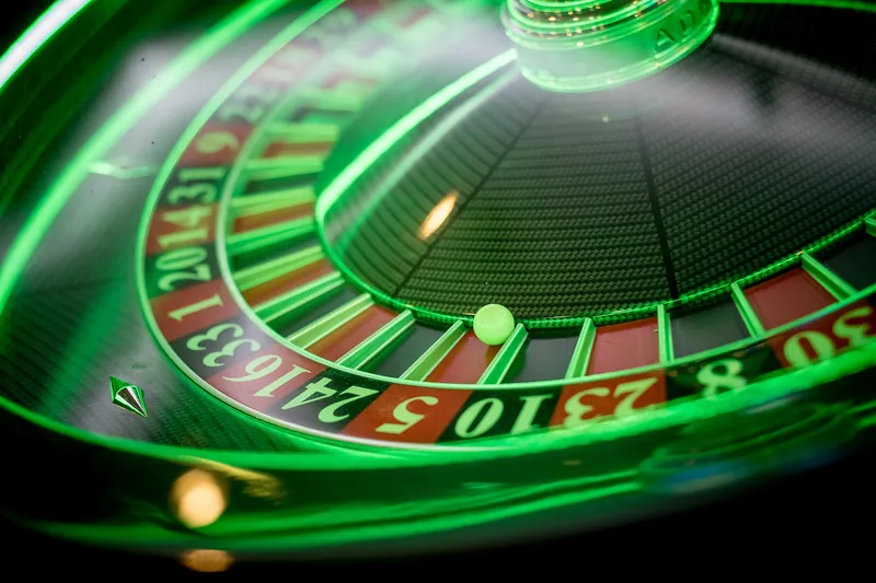 Green-lit roulette wheel at Casino JOA de Bourbonne-les-Bains