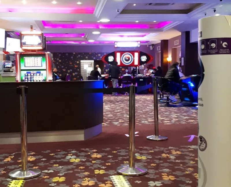 Reception desk beside the gaming floor at Casino JOA de Châtelaillon