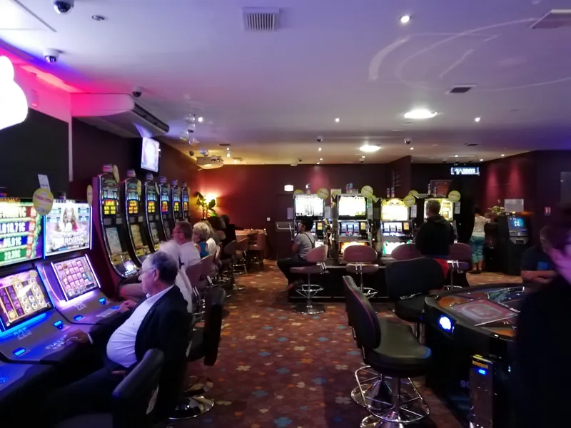 Guests playing on the gaming floor at Casino JOA de Fouras