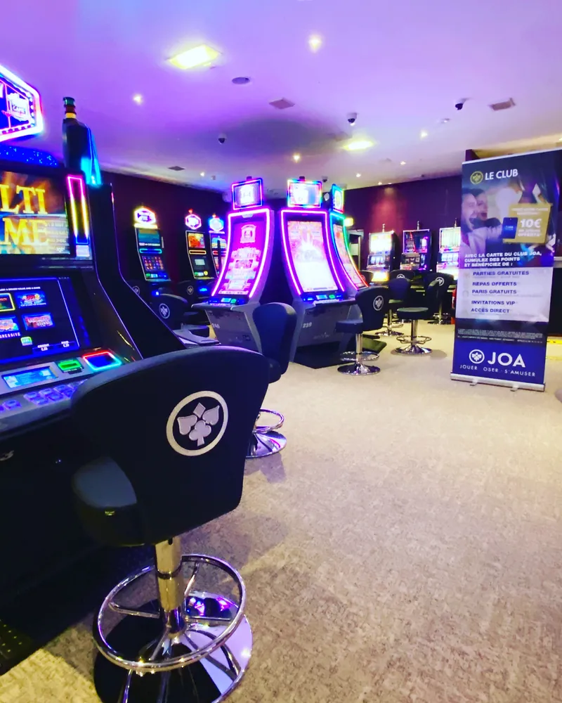Purple-lit slot machines at Casino JOA de Fouras