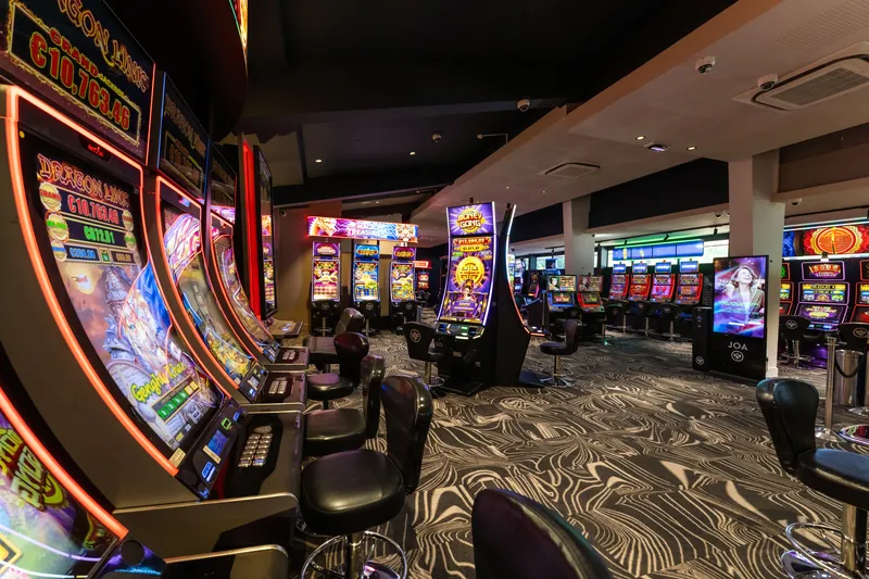 Curved row of slot machines at Casino JOA de Gérardmer