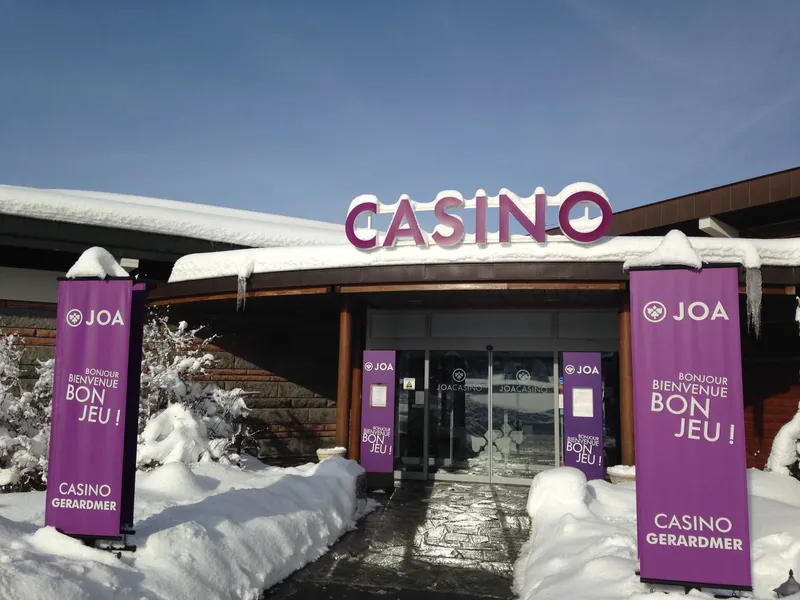 Snow-covered entrance to Casino JOA de Gérardmer