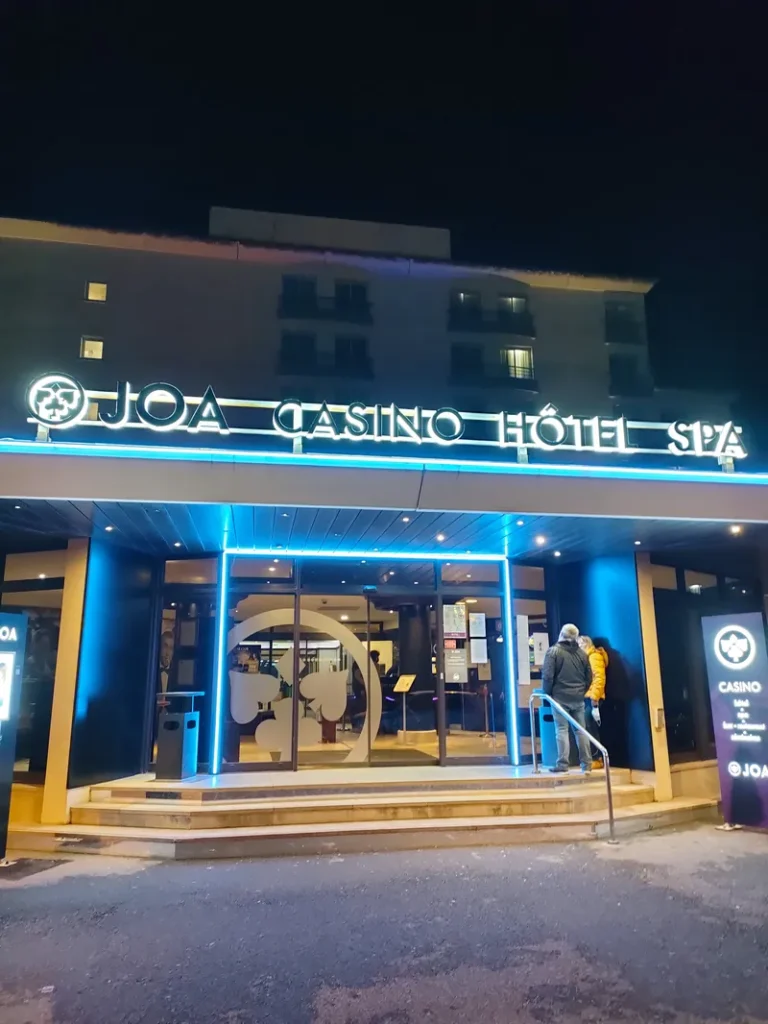 Blue-lit hotel entrance at Casino JOA de Saint-Brevin l'Océan